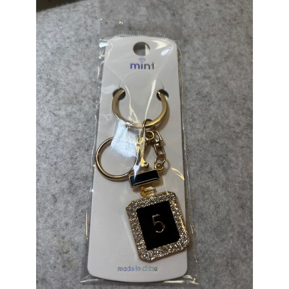 #4. Black Bag Charm Key Chain Perfume-inspired